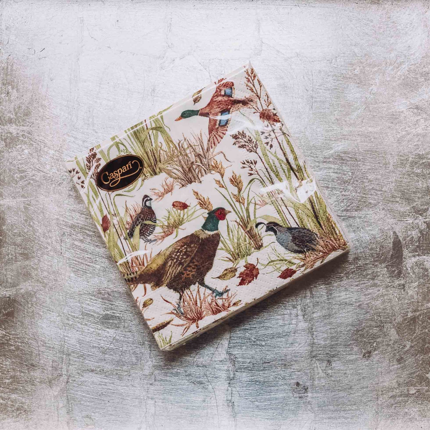 Indulge in luxury with our Caspari triple-ply Cocktail Napkins. Made in Germany, these napkins feature exquisite artwork and designs from around the world, printed with nontoxic, water-soluble dyes and food-safe ink. Elevate your entertaining with sophistication and taste. Comes in sets of 20 napkins in 17 different designs.