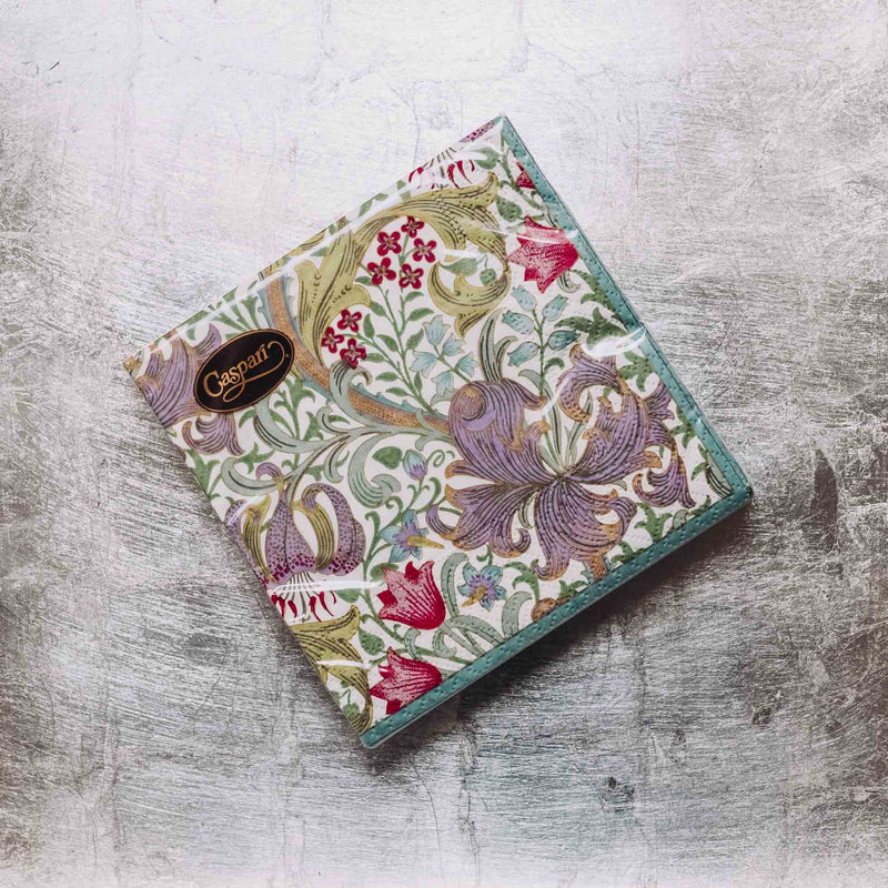 Indulge in luxury with our Caspari triple-ply Cocktail Napkins. Made in Germany, these napkins feature exquisite artwork and designs from around the world, printed with nontoxic, water-soluble dyes and food-safe ink. Elevate your entertaining with sophistication and taste. Comes in sets of 20 napkins in 17 different designs.