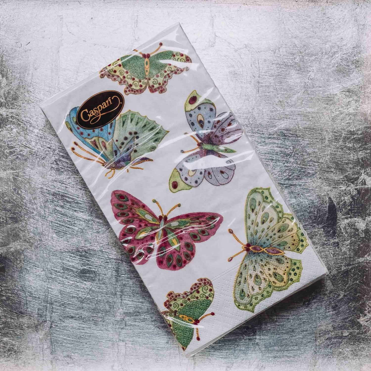 Indulge in luxury with our Caspari triple-ply Guest Towels. Made in Germany, these napkins feature exquisite artwork and designs from around the world, printed with nontoxic, water-soluble dyes and food-safe ink. Elevate your entertaining with sophistication and taste. Comes in sets of 15 napkins in 24 different designs.